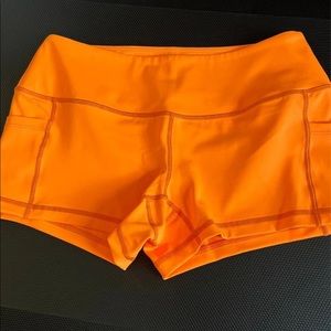 Feed Me Fight Me Neon Orange shorts